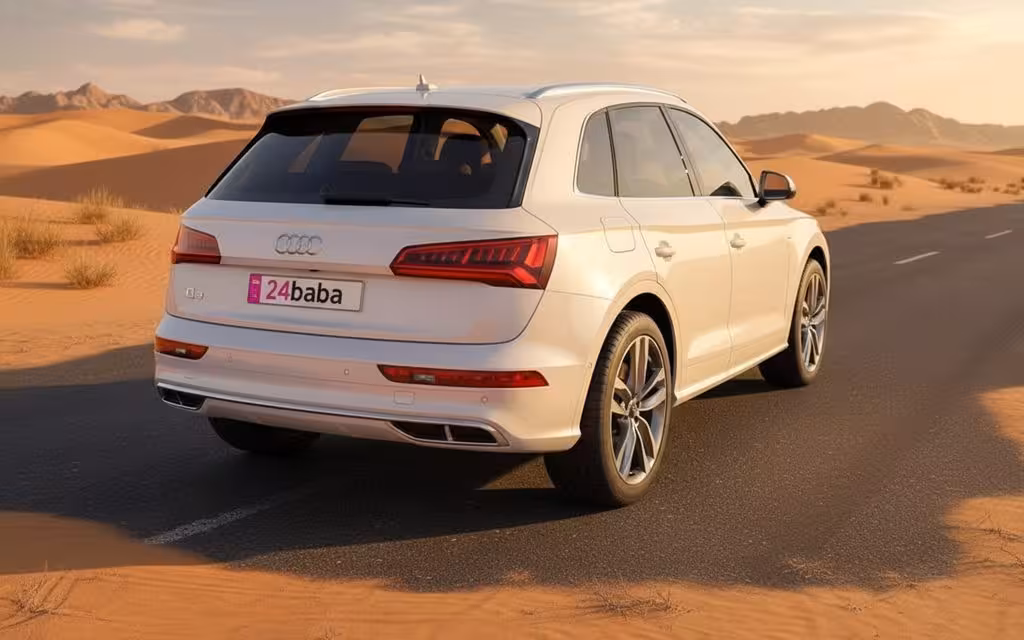 Audi Q5 2024 White rear view showing taillights – rental in Dubai