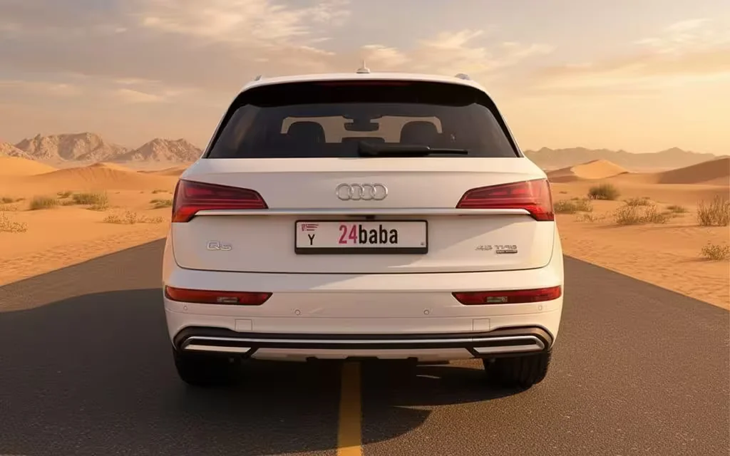 Audi Q5 2024 White rear view showing taillights – rental in Dubai