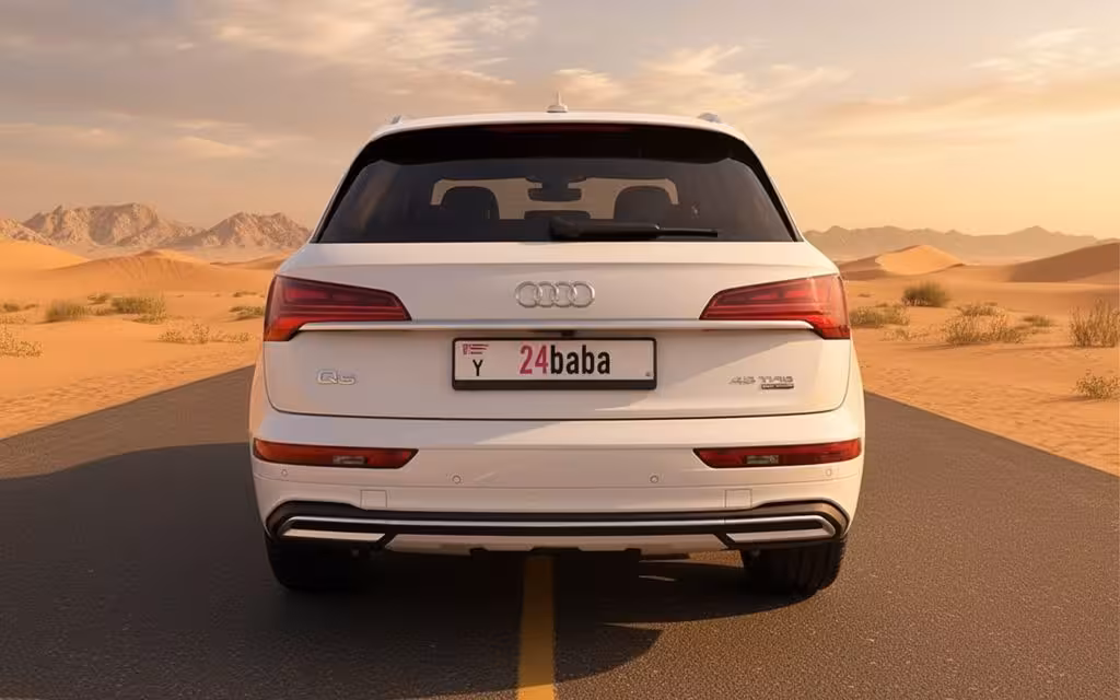 Audi Q5 2024 White rear view showing taillights – rental in Dubai