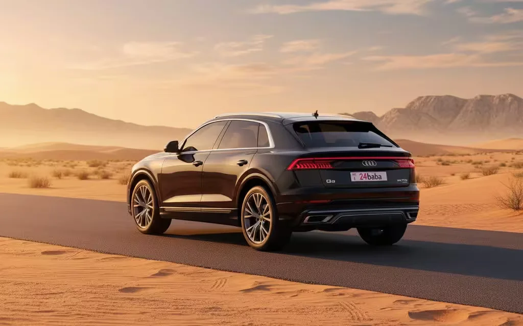 Audi Q8 stand in the sand 