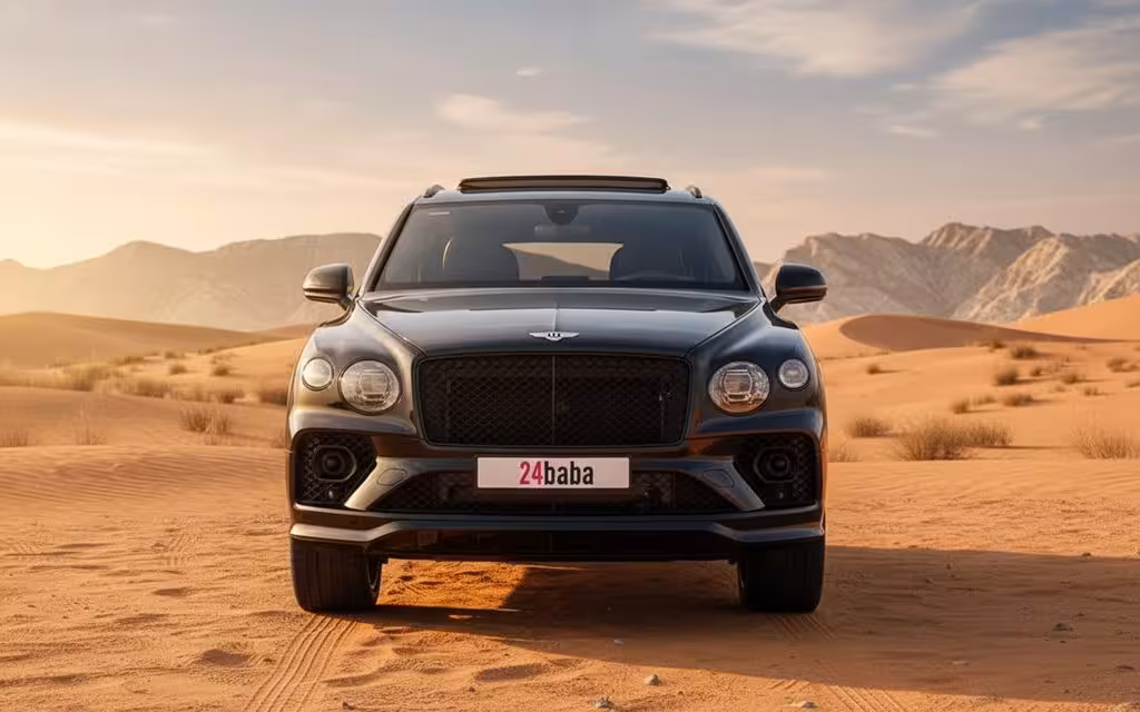 Bentley Bentayga 2022 Black front view with headlights – rental in Dubai