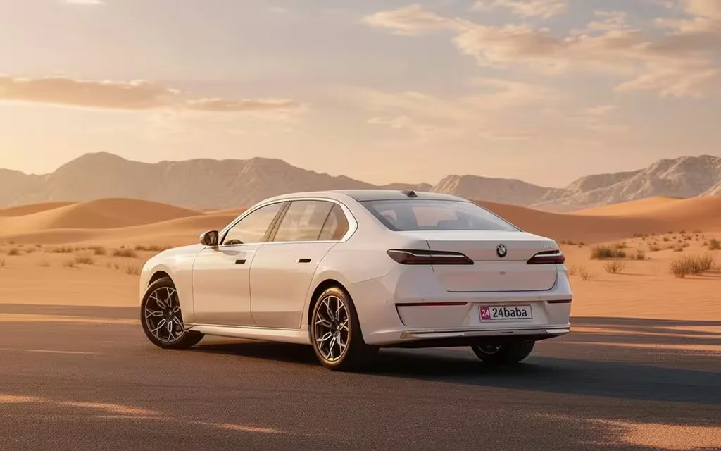 Bmw 735 2023 white rear view showing taillights – rental in Dubai