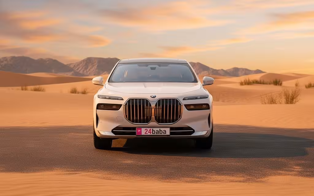 Bmw 735 2023 white front view with headlights – rental in Dubai