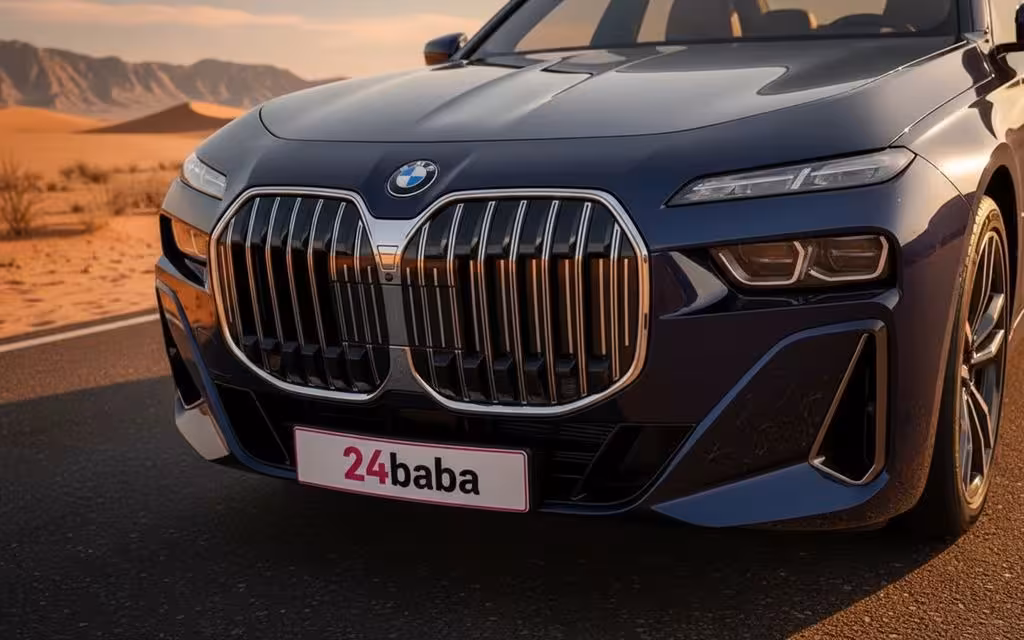 Bmw 735 2023 blue front view with headlights – rental in Dubai