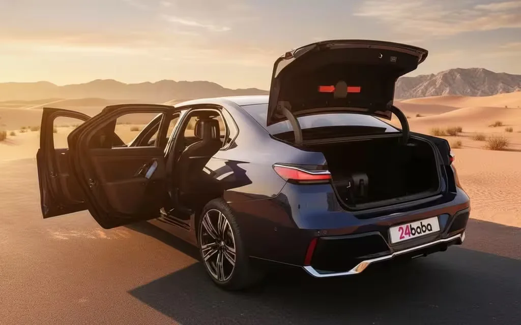 Bmw 735 2023 blue rear view showing taillights – rental in Dubai