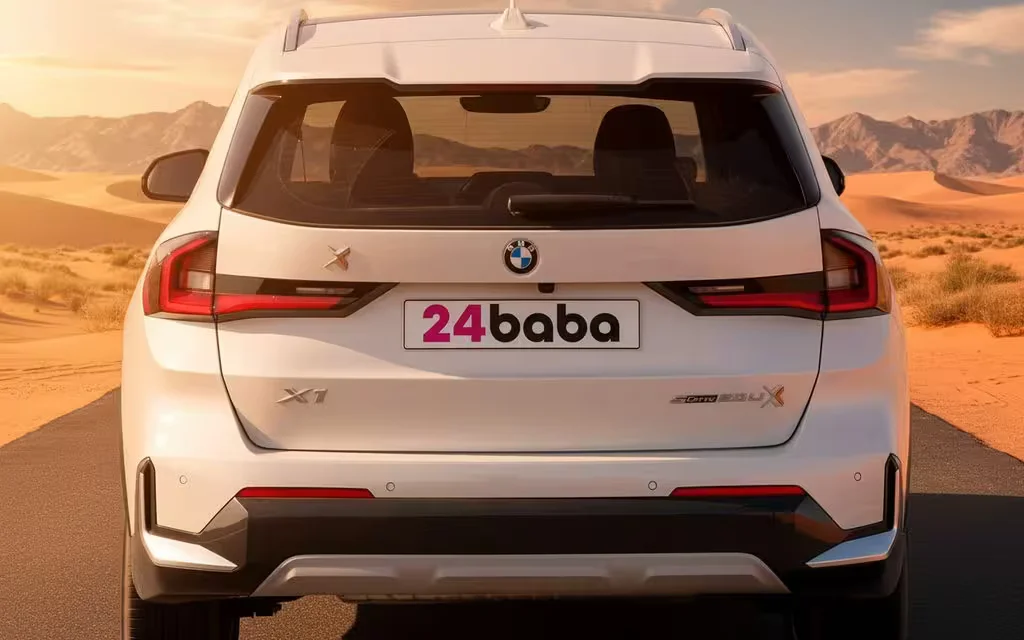 Bmw X1 2024 White rear view showing taillights – rental in Dubai