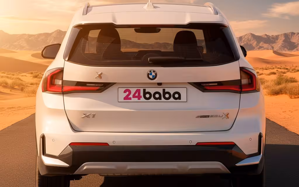 Bmw X1 2024 White rear view showing taillights – rental in Dubai