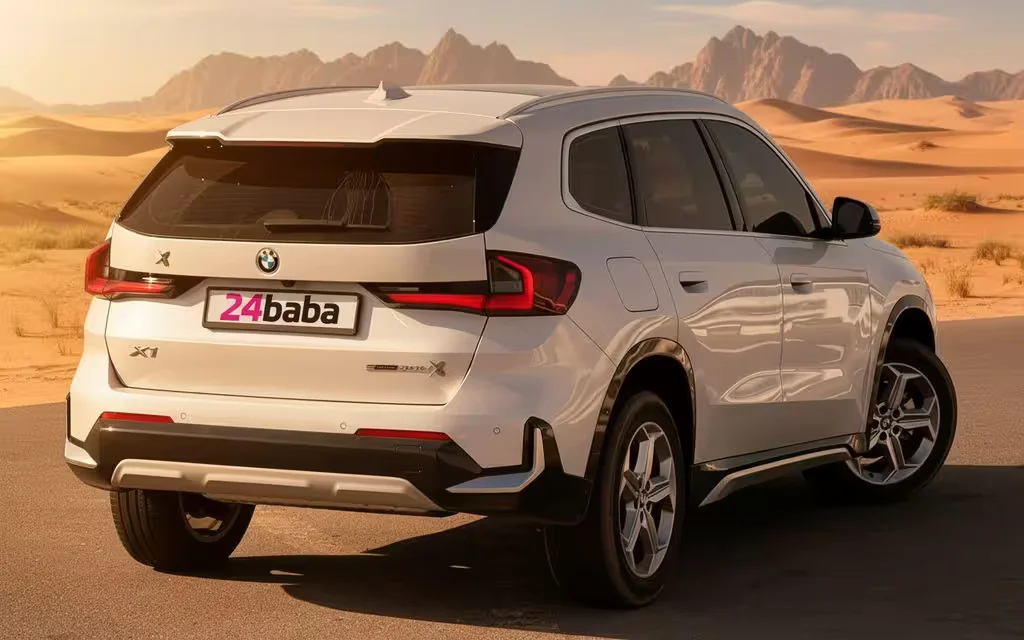 Bmw X1 2024 White rear view showing taillights – rental in Dubai