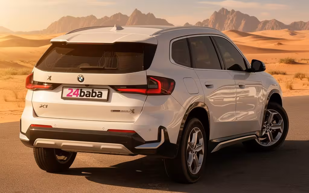 Bmw X1 2024 White rear view showing taillights – rental in Dubai
