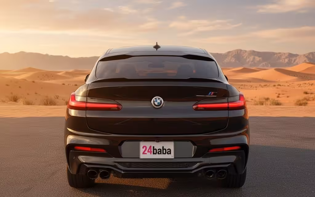 Bmw X4 2020 Black rear view showing taillights – rental in Dubai