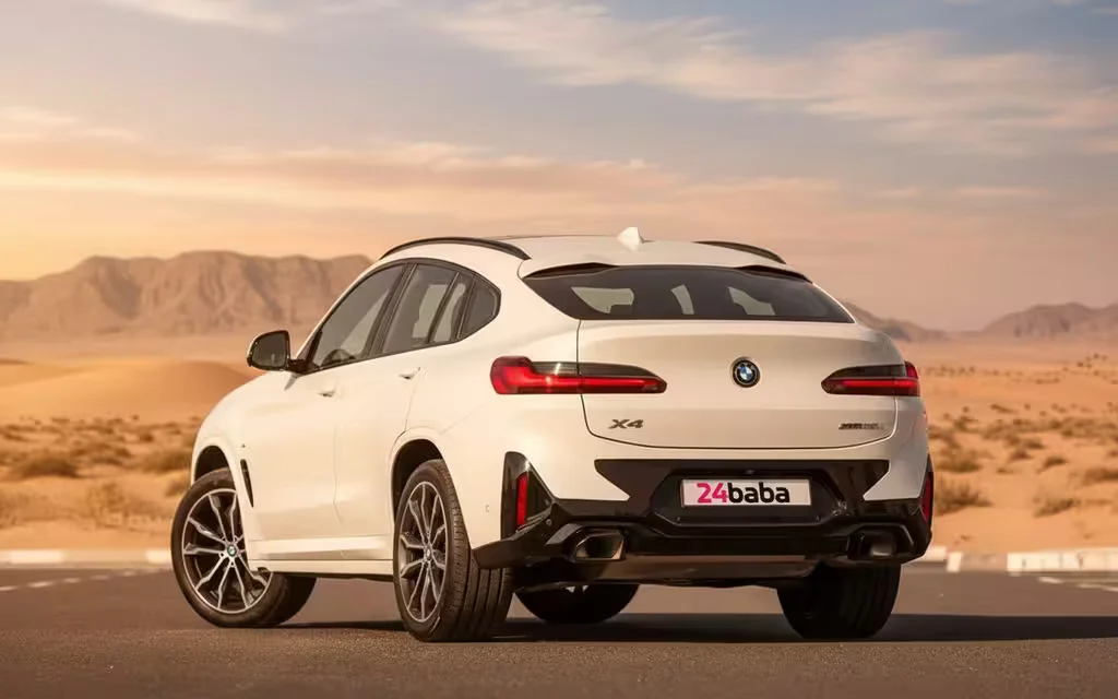 Bmw X4 2024 White rear view showing taillights – rental in Dubai
