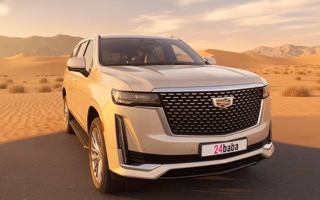 Cadillac Escalade 2021 Beige front view with headlights – rental in Dubai
