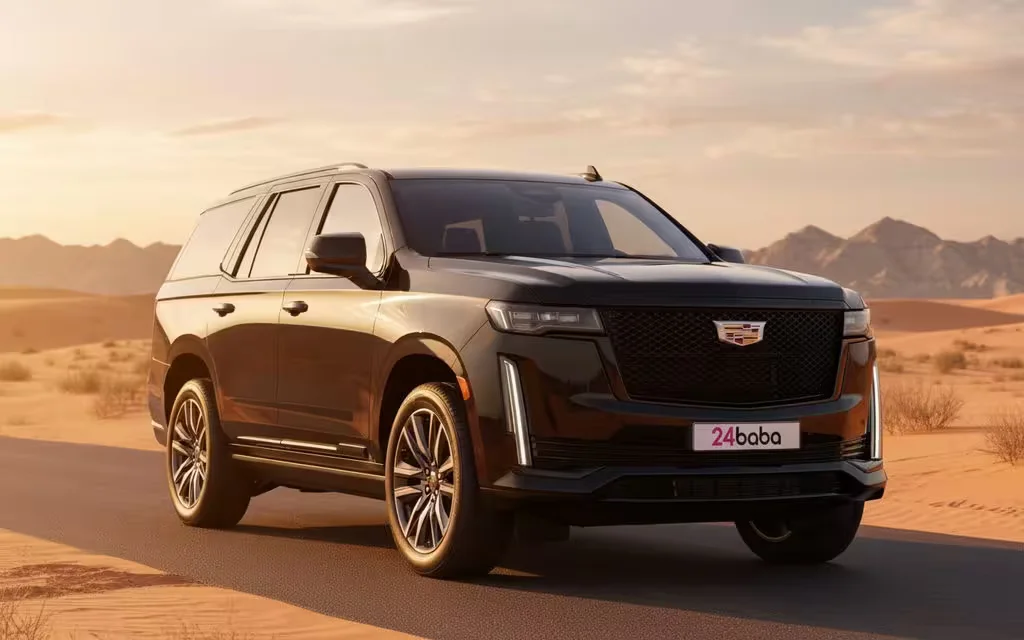 Cadillac Escalade 2023 Black front view with headlights – rental in Dubai