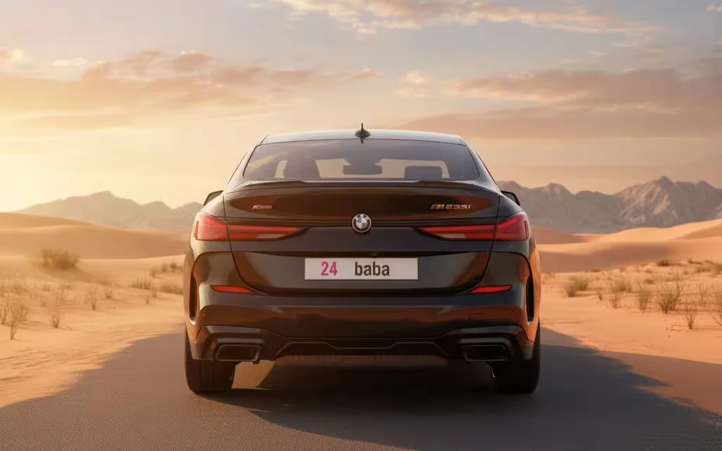 Bmw 235 2021 Black rear view showing taillights – rental in Dubai