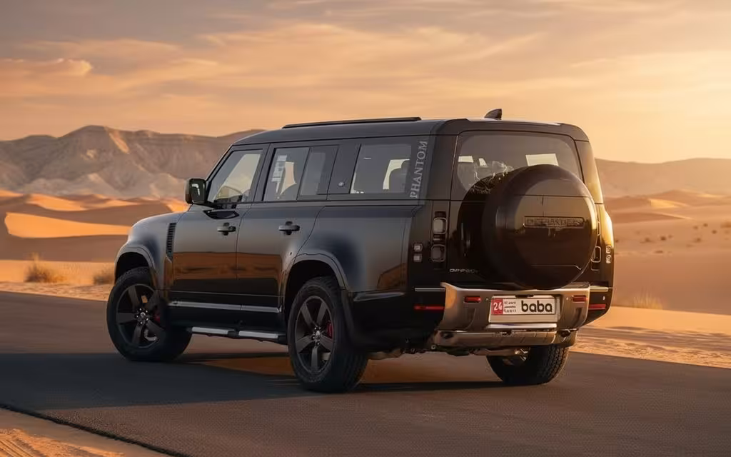 LandRover Defender 2023 Black rear view showing taillights – rental in Dubai