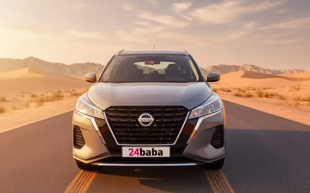 Nissan Kicks 2022 Grey front view with headlights – rental in Dubai