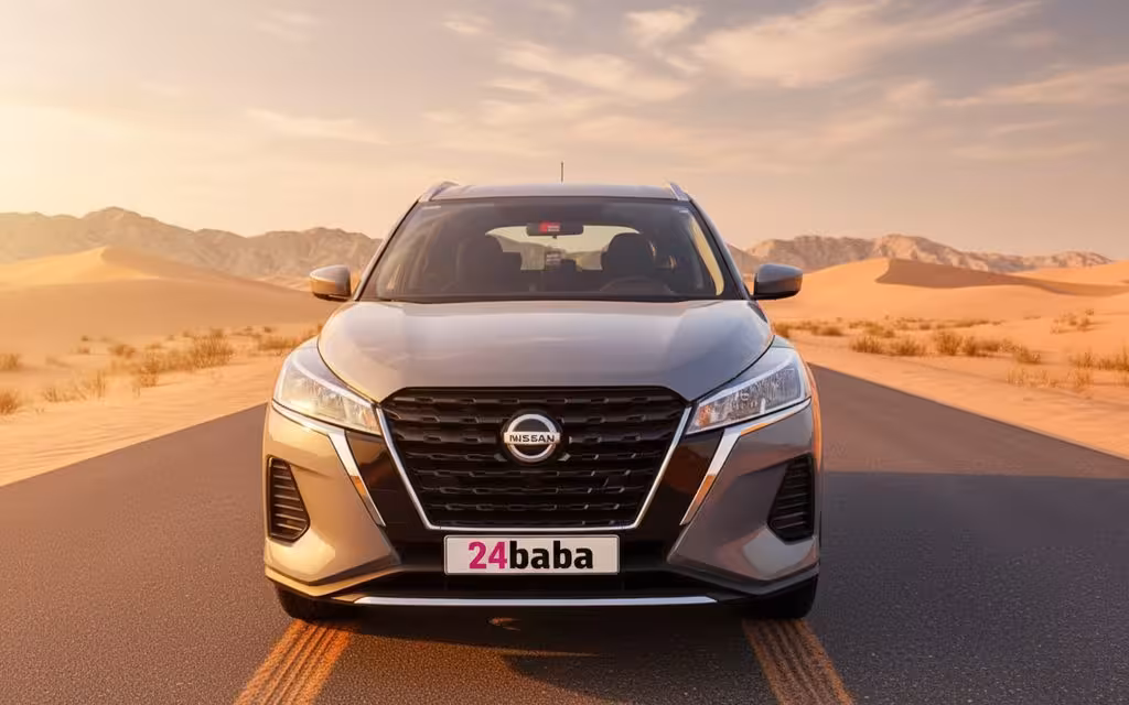 Nissan Kicks 2022 Grey front view with headlights – rental in Dubai