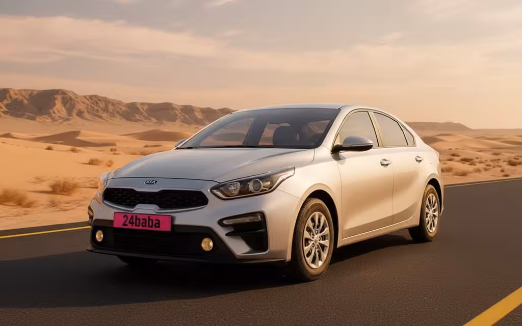 Kia Cerato 2025 Silver front view with headlights – rental in Dubai