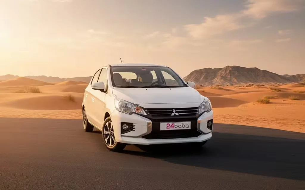 Mitsubishi Mirage 2023 White front view with headlights – rental in Dubai