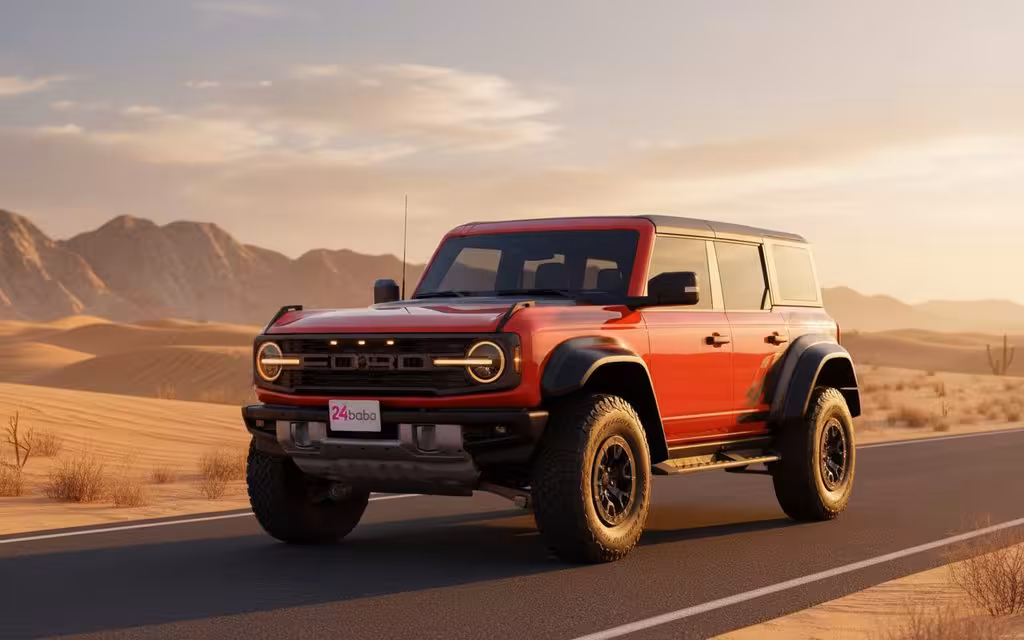 Ford Bronco 2023 Orange front view with headlights – rental in Dubai