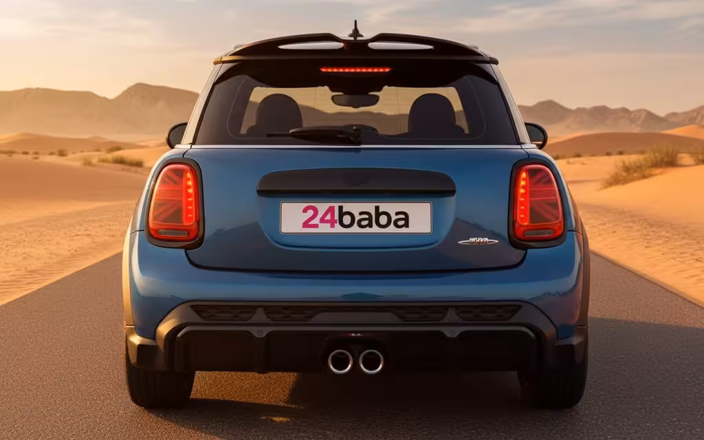 Mini Cooper 2024 Blue rear view showing taillights – rental in Dubai