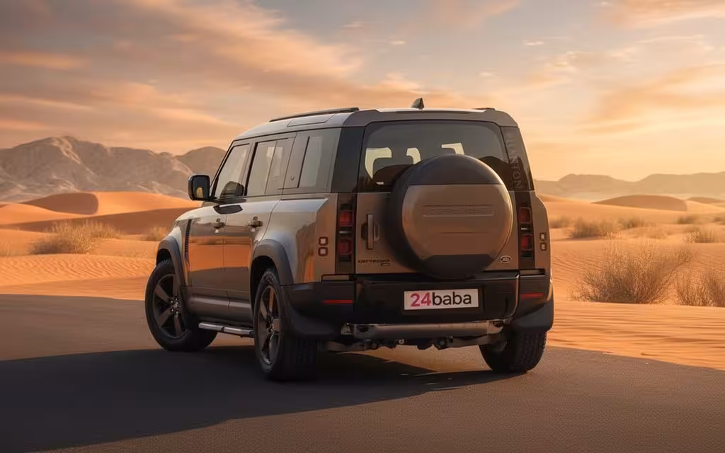 LandRover Defender 2023 Brown rear view showing taillights – rental in Dubai