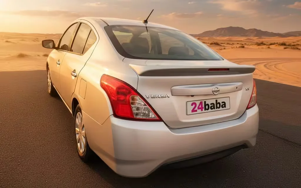 Nissan Versa 2025 Silver rear view showing taillights – rental in Dubai