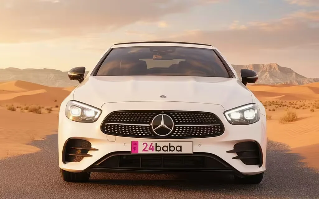 Mercedes E450 2022 White front view with headlights – rental in Dubai