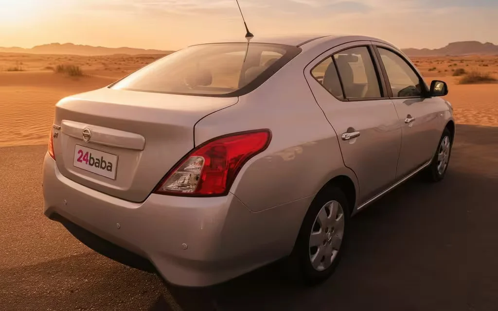 Nissan Sunny 2022 Grey rear view showing taillights – rental in Dubai