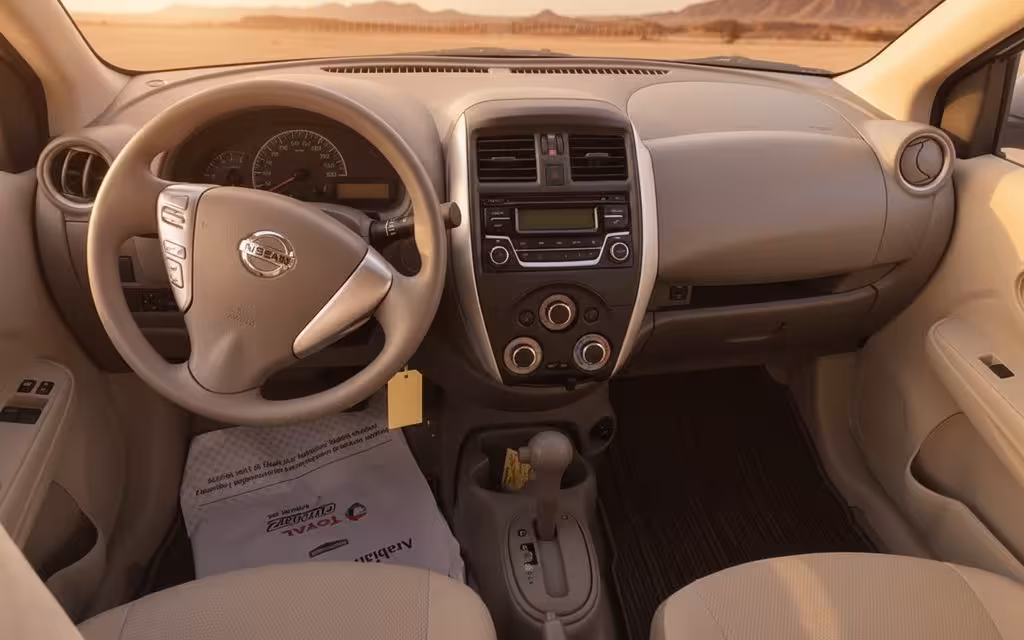 Nissan Sunny 2022 interior view showing trim – rental in Dubai