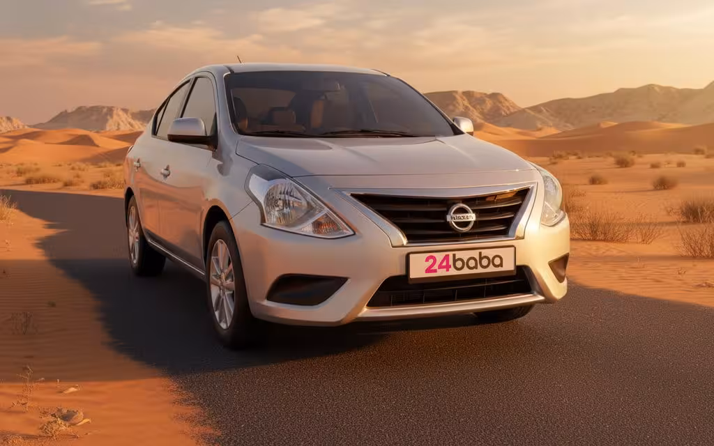 Nissan Sunny 2021 Silver front view with headlights – rental in Dubai