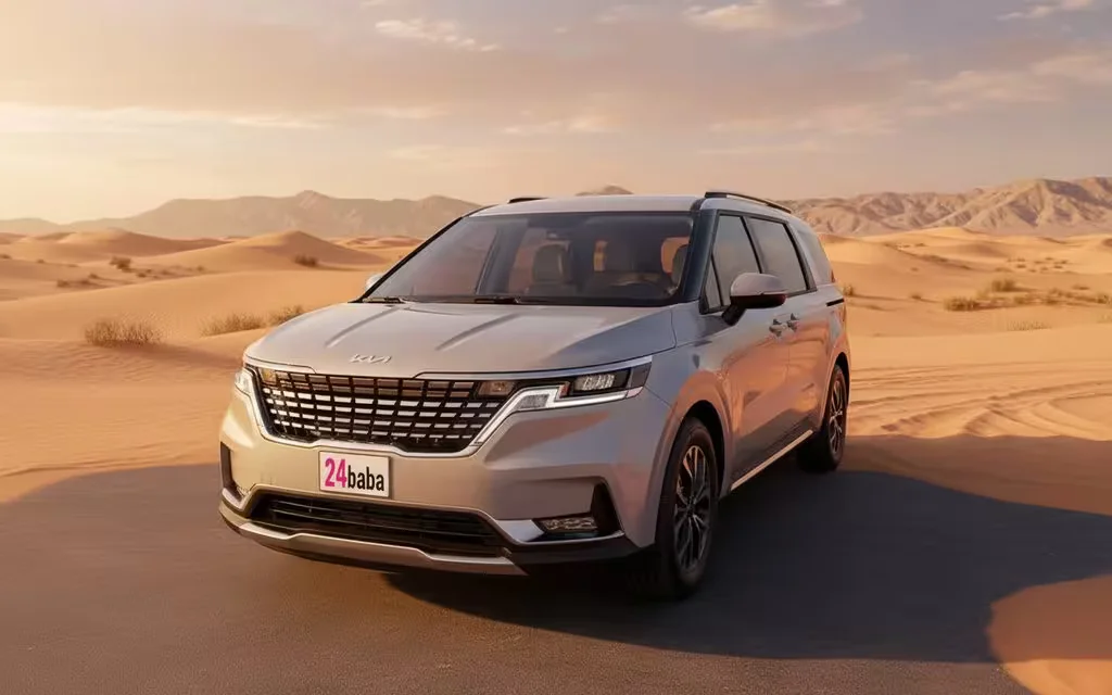 Kia Carnival 2023 Grey front view with headlights – rental in Dubai