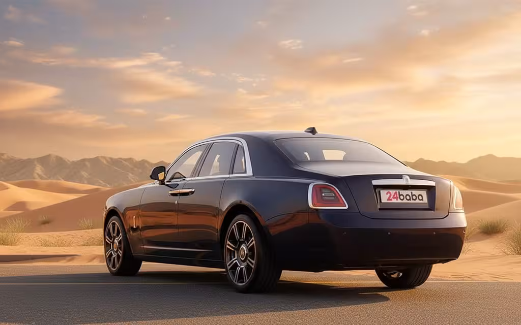 RollsRoyce Ghost 2024 Blue rear view showing taillights – rental in Dubai