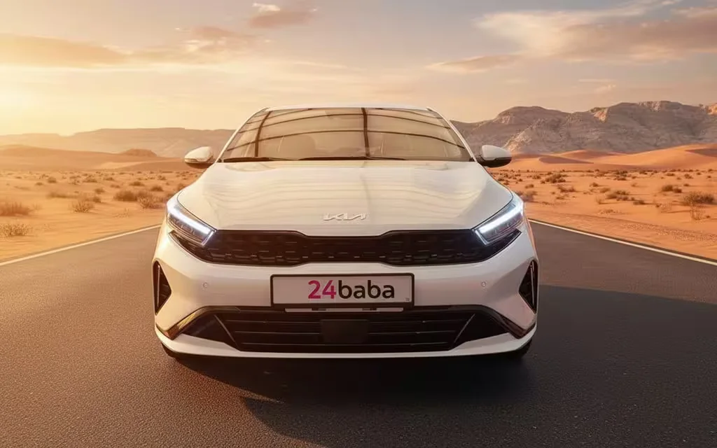 Kia K3 2024 White front view with headlights – rental in Dubai