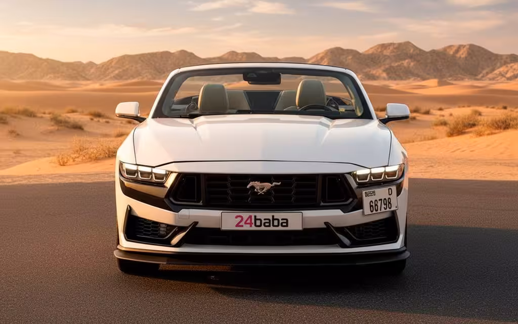 Ford Mustang 2024 White front view with headlights – rental in Dubai