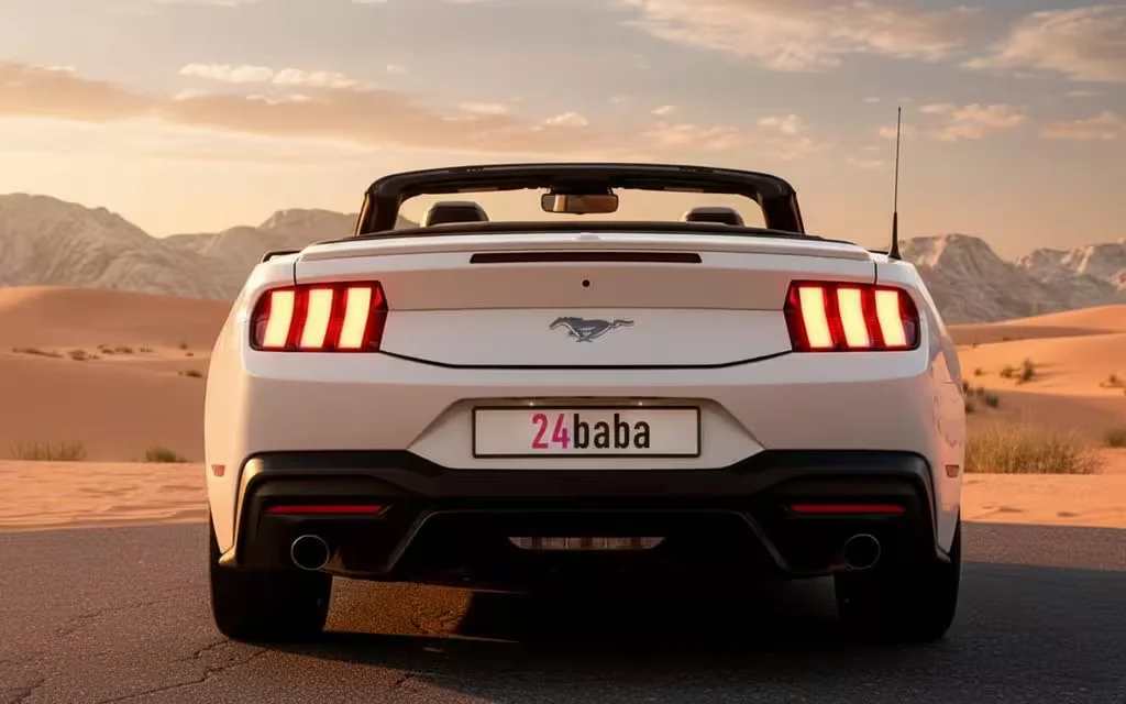 Ford Mustang 2024 White rear view showing taillights – rental in Dubai