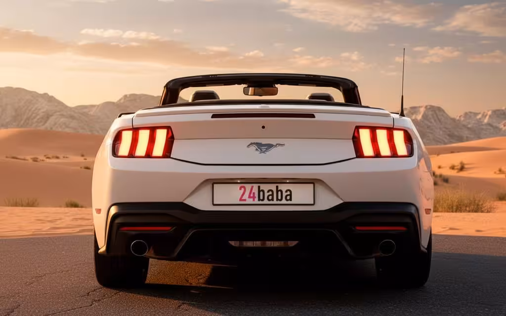 Ford Mustang 2024 White rear view showing taillights – rental in Dubai