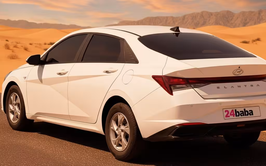 Hyundai Elantra 2023 White rear view showing taillights – rental in Dubai