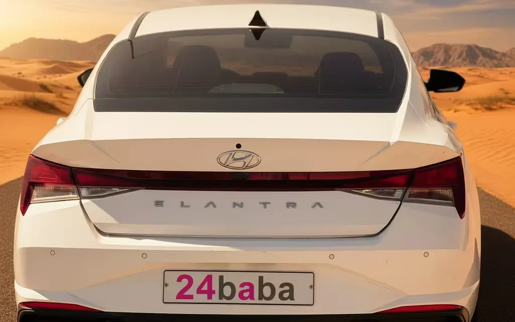 Hyundai Elantra 2023 White rear view showing taillights – rental in Dubai