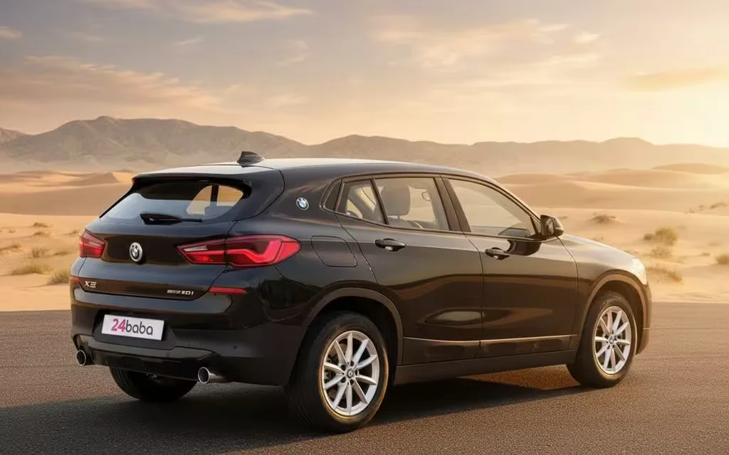 Bmw X2 2023 Black rear view showing taillights – rental in Dubai