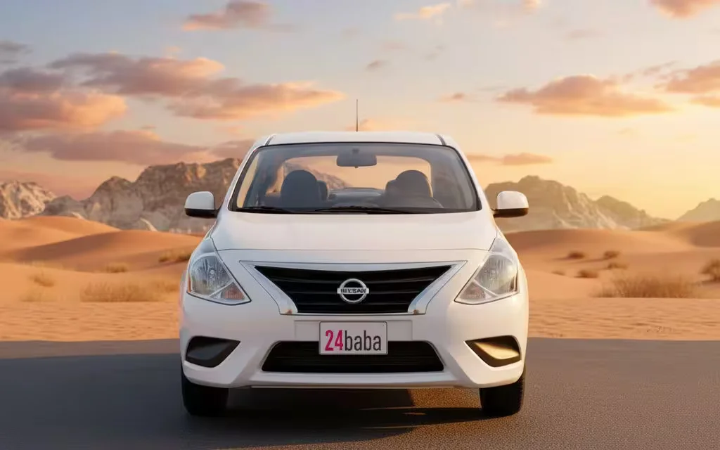 Nissan Sunny 2024 White front view with headlights – rental in Dubai