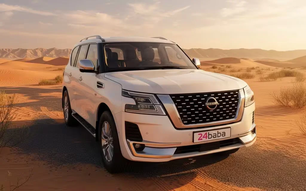 Nissan Patrol 2022 White front view with headlights – rental in Dubai