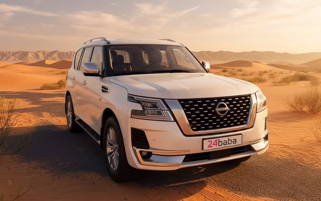Nissan Patrol 2022 White front view with headlights – rental in Dubai
