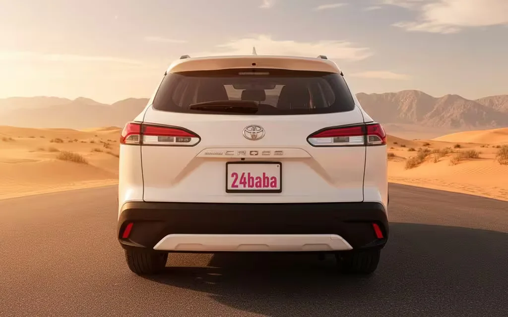 Toyota CorollaCross 2024 White rear view showing taillights – rental in Dubai
