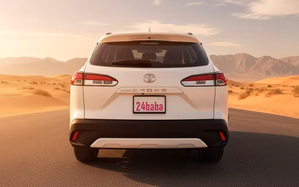 Toyota CorollaCross 2024 White rear view showing taillights – rental in Dubai