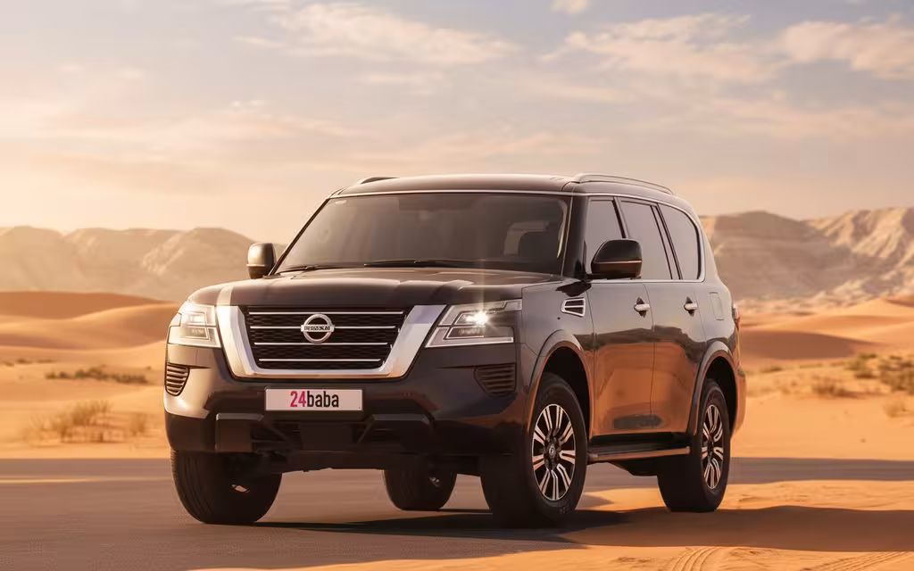 Nissan Patrol 2021 Blue front view with headlights – rental in Dubai