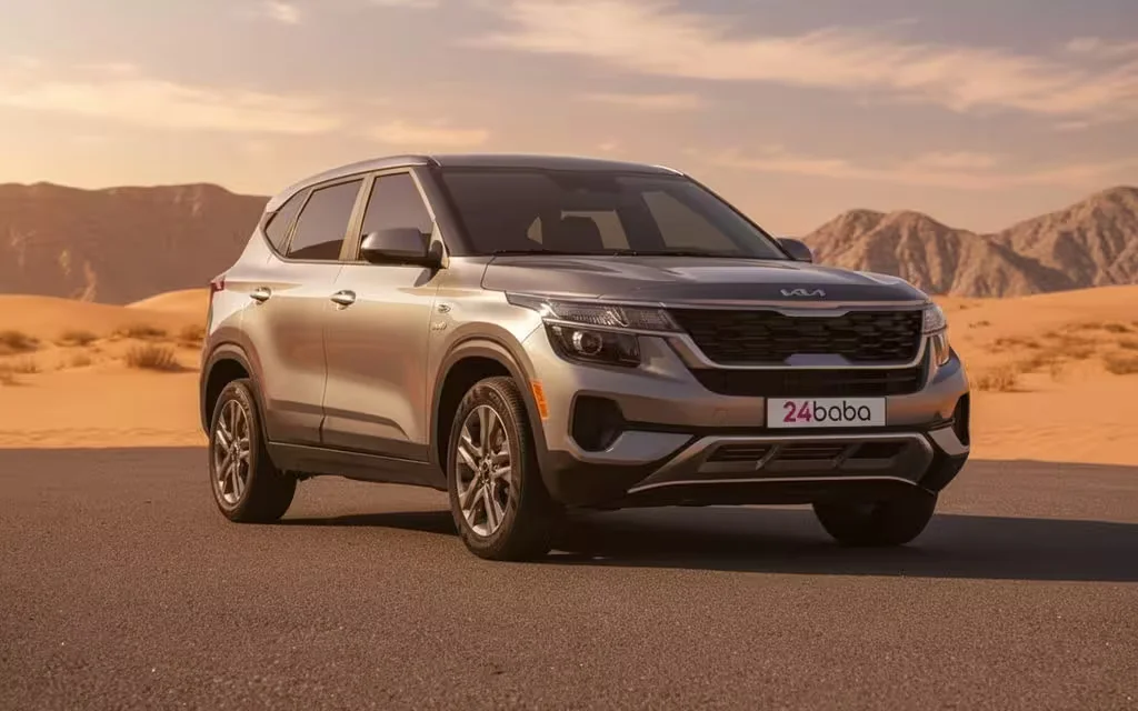 Kia Seltos 2023 Grey front view with headlights – rental in Dubai