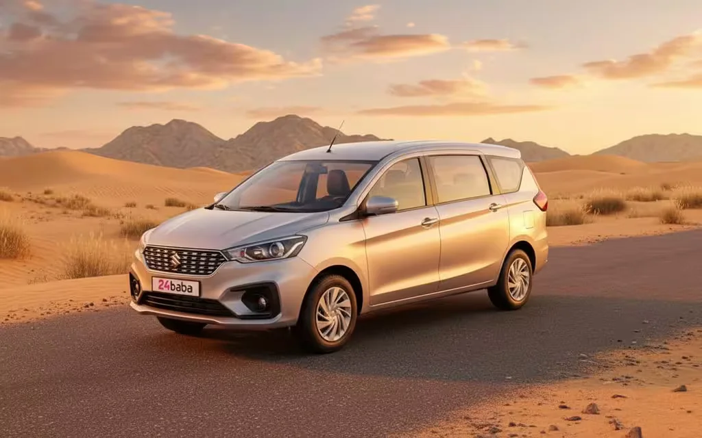 Suzuki Ertiga 2023 Silver front view with headlights – rental in Dubai