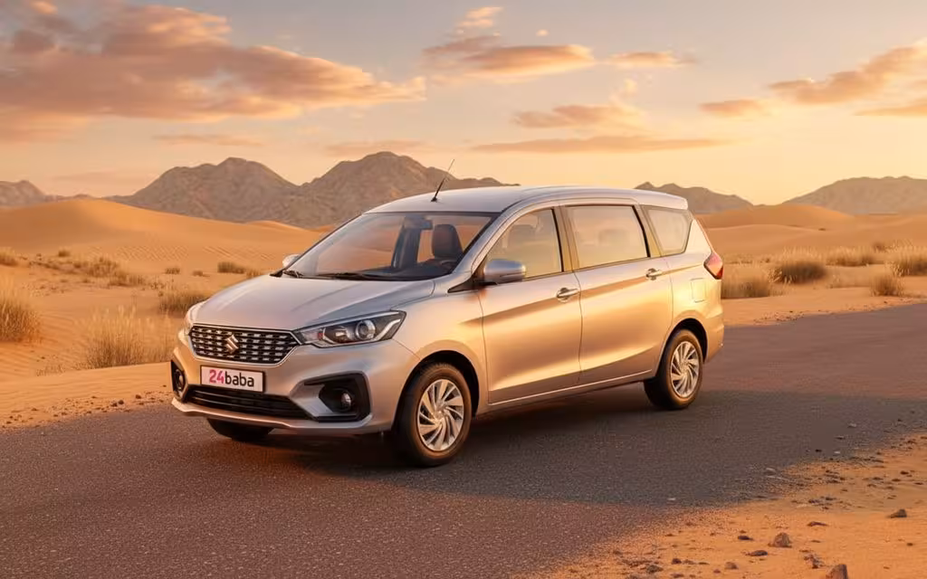 Suzuki Ertiga 2023 Silver front view with headlights – rental in Dubai