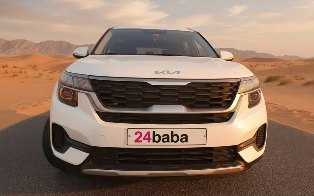 Kia Seltos 2022 White front view with headlights – rental in Dubai